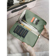 Porta passaporto Stackers Wave Family - verde schiuma di mare